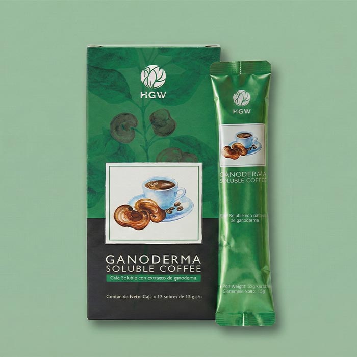 Caja y sachet individual de Café Soluble Ganoderma HGW sobre fondo color menta.